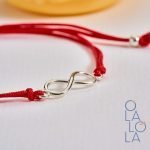 pulsera infinito con hilo rojo